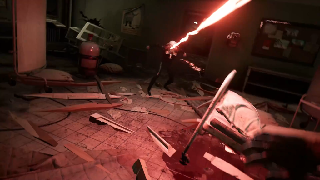 Nude figures stand in glass cells with lights