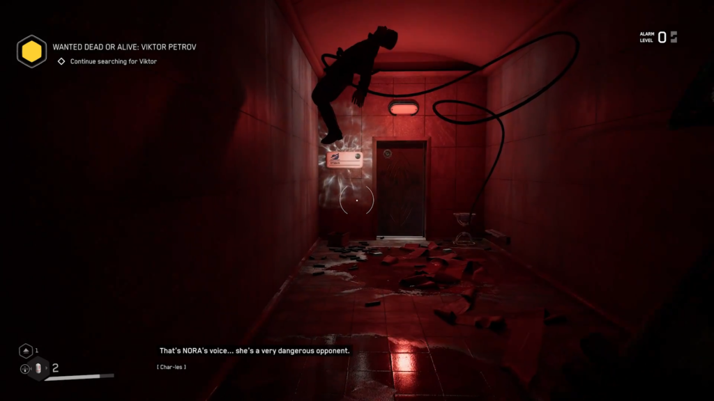 First-person view walking through red-lit metal tunnel