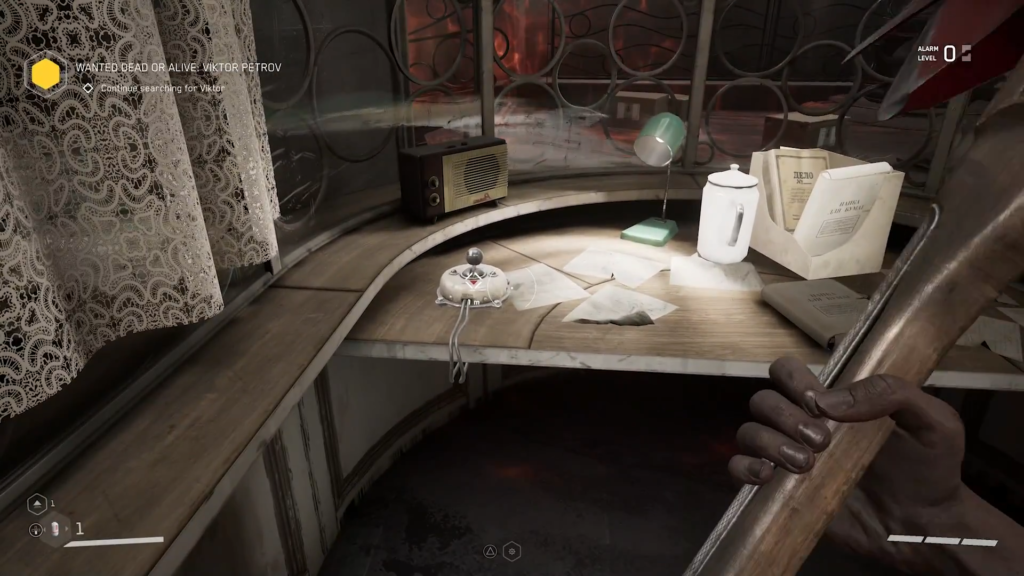 Gloved hand reaching toward shattered glass ceiling indoors