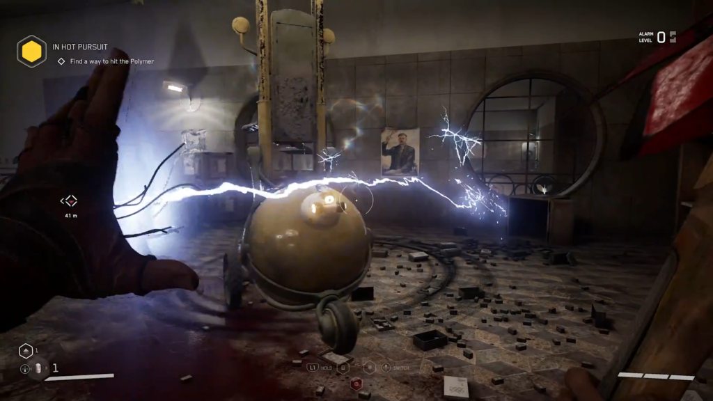 Suitcase on floor beside chair in room