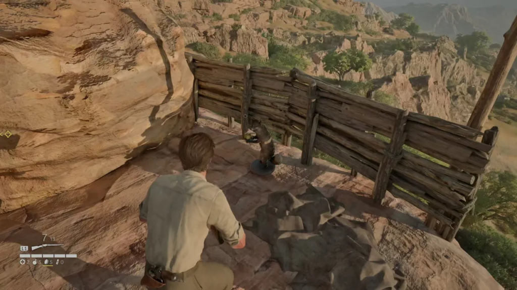 Игрок целится в змею на скалистом уступе