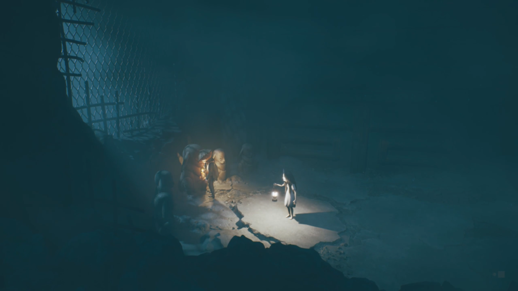 Шестая держит фонарь в пещере Little Nightmares 2