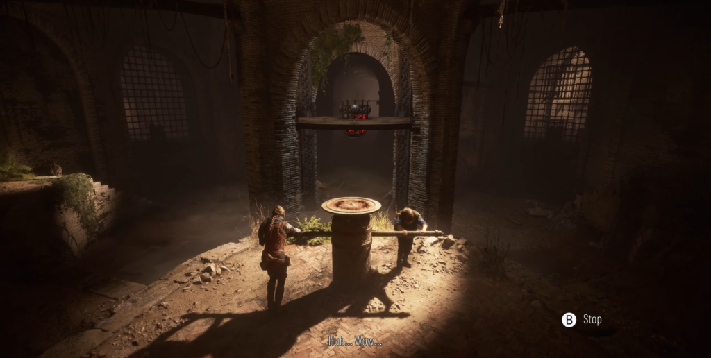 Амиция и Гуго крутят рычаг в руинах A Plague Tale