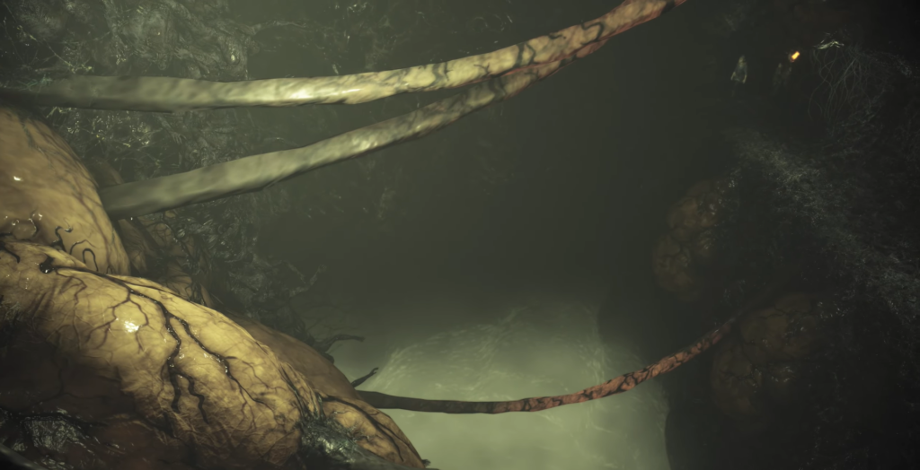 Щупальца тянутся в тёмной пещере с туманом